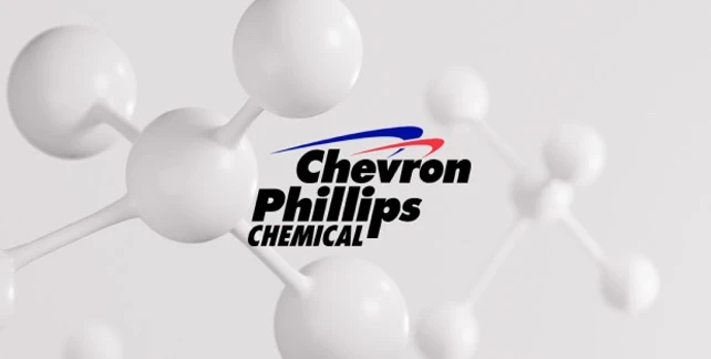 The Chevron Phillips Chemical logo is superimposed over a white three-dimensional model of a molecule.