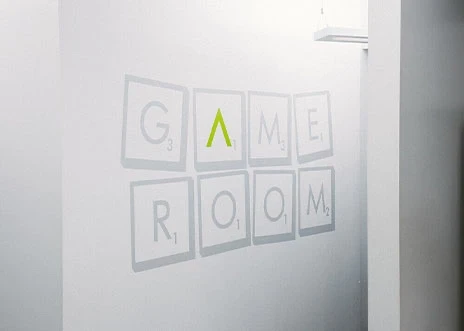 One of the conference rooms at Adcetera’s Midtown Houston office is identified by a sign printed on the wall: “Game Room” in letters styled to resemble Scrabble tiles.