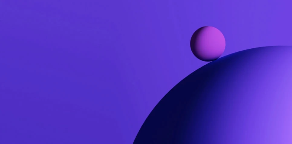 3D rendering of a small lavender sphere adjacent to a larger, dark purple sphere against a violet background.