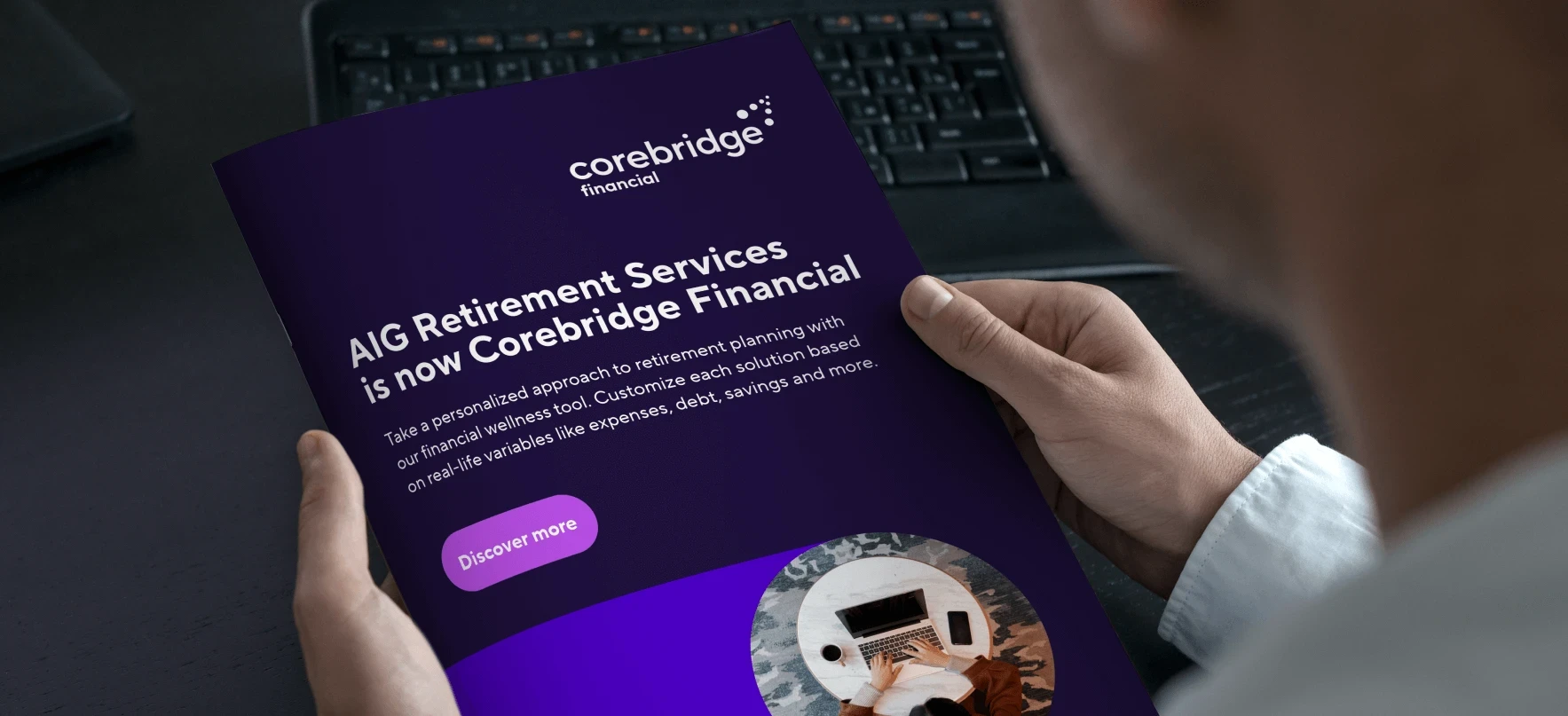 A man holds a purple Corebridge Financial brochure with the headline, “AIG Retirement Services is now Corebridge Financial.”