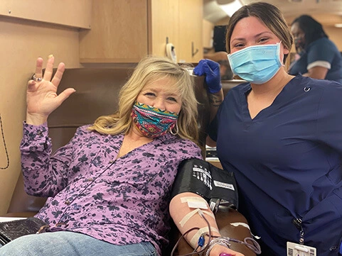 Adcetera Founder and CEO Kristy Sexton donates blood.