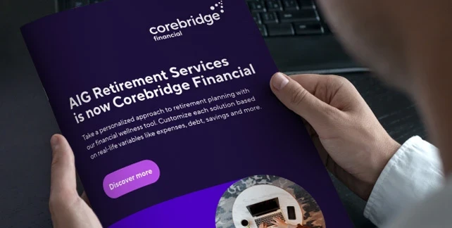 A man holds a purple Corebridge Financial brochure with the headline, “AIG Retirement Services is now Corebridge Financial.”