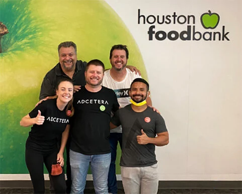 Adcetera employees volunteer at the Houston Food Bank.